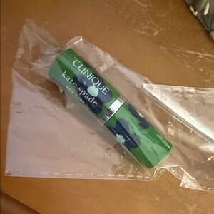 Clinique Kate Spade Green and Navy Floral Lipstick sealed PLUM POP